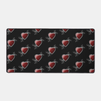 Red Love Heart Glowing Against Midnight Black Desk Mat