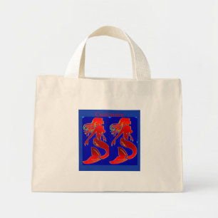 red mermaids on blue  mini tote bag