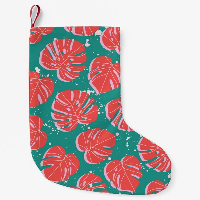 Red monstera leaves on green seamless pattern. Tre Small Christmas Stocking (Front)