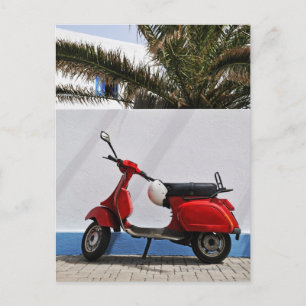 Red motor scooter by wall, Stromboli Island, Postcard