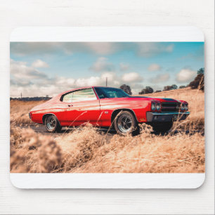 Red Muscle Car in grass. Mouse Pad