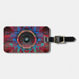 Red music speakers on a cracked wall luggage tag