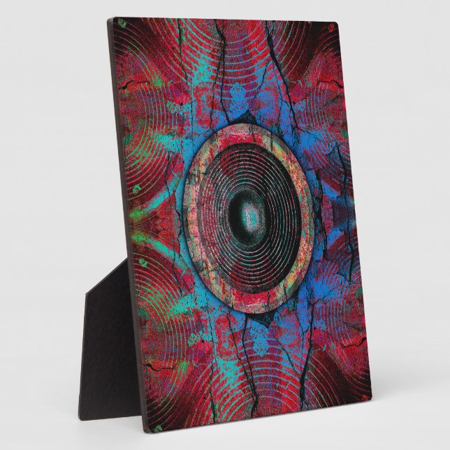 Red music speakers on a cracked wall plaque (Side)