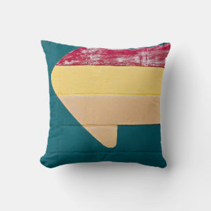 Red, orange, and yellow arrow signage cushion