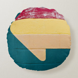 Red, orange, and yellow arrow signage round cushion