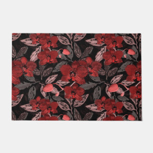 Red orchids on black. doormat