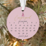 Red Pagoda Christmas Tree Engagement Calendar  Ornament<br><div class="desc">Dusty Pink & Red Pagoda Christmas Tree Engagement Calendar 1-Photo Ornament Celebrate your engagement with our Dusty Pink and Red Pagoda Christmas Tree Engagement Calendar 1-Photo Ornament! This unique ornament features the word "Engaged" along with a customisable calendar where you can mark your special date by moving the heart to...</div>