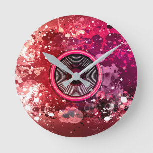 Red paint splatters round clock