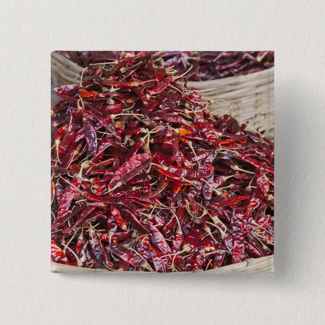 Red peppers at local produce market 15 cm square badge (Front)