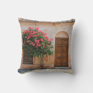 RED PETAL FLOWER ON CONCRETE WALL CUSHION