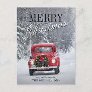 Red Pickup Truck Driving in Snow Holiday Postcard