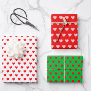 Red & pink heart pattern on green, red & white wrapping paper sheet
