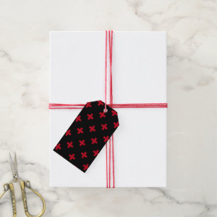 Red polka crosses on black gift tags