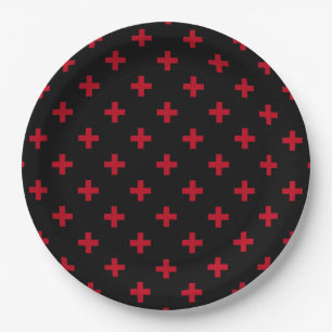 Red polka crosses on black paper plate