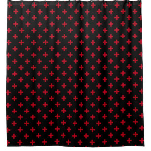 Red polka crosses on black shower curtain