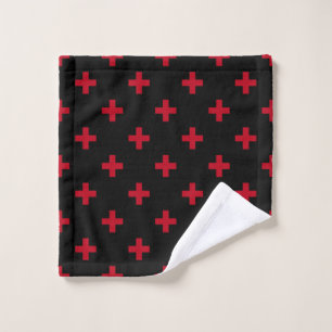 Red polka crosses on black wash cloth