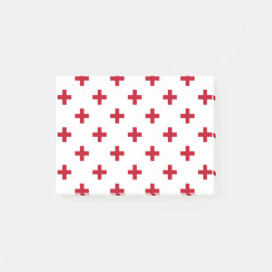 Red polka crosses on white post-it notes