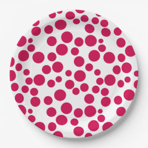 red polka dots on a white background paper plate
