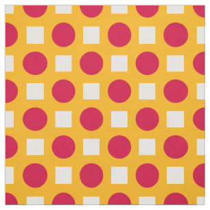 Red polka dots on yellow fabric