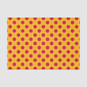 Red polka dots on yellow tissue paper