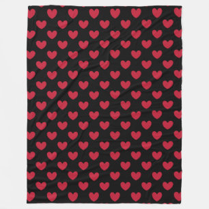 Red polka hearts on black fleece blanket