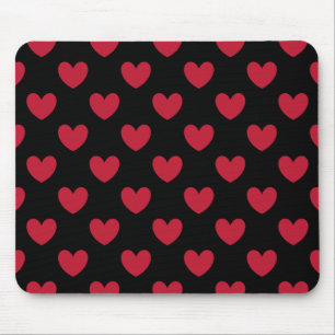 Red polka hearts on black mouse pad