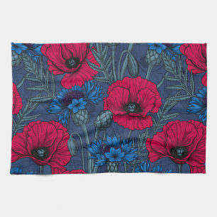 Red poppies and blue cornflowers on blue tea towel