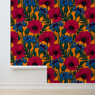 Red poppies and blue cornflowers on orange wallpaper