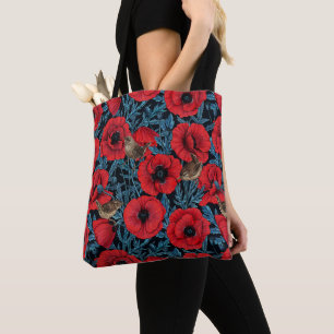 Red poppies and wrens, blue leaves on black tote bag