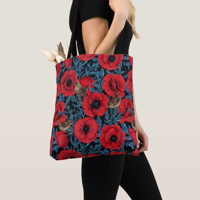 Red poppies and wrens, blue leaves on black tote bag (Close Up)