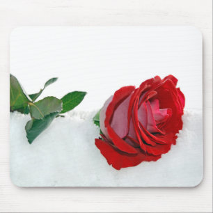 red rose in snow mouse pad