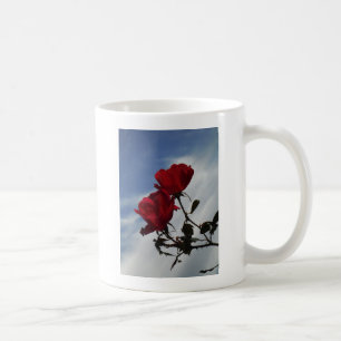 Red Roses Against a Bright Blue Sky Coffee Mug