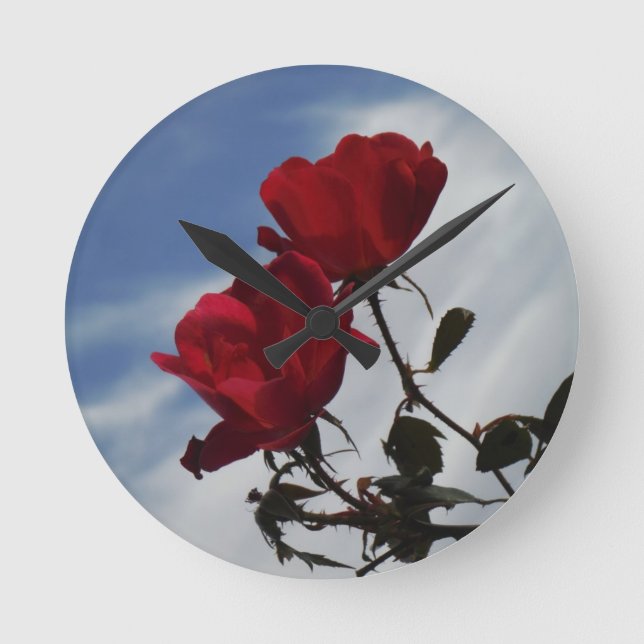 Red Roses Against a Bright Blue Sky Round Clock (Front)