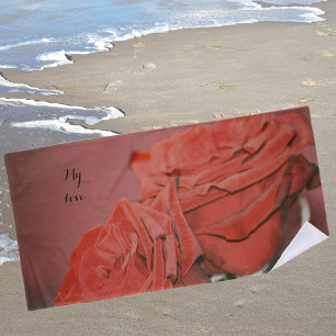 Red roses like velvet beach towel