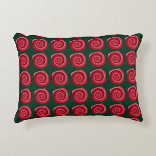 Red roses on a green backgroundabstract, backgroun decorative cushion