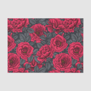 Red roses with gray leaves on black tissue paper