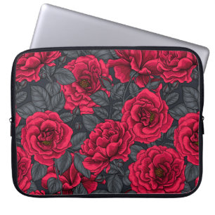 Red roses with grey leaves on black laptop sleeve