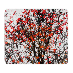 Red rowan fruits or ash berries cutting board