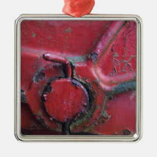 Red rusty truck close-up metal ornament