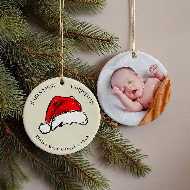 Red Santa Hat Baby's First Christmas Photo Ceramic Ornament (Baby's First Christmas Santa Hat photo personalized ornament.)