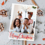 Red Script Merry Christmas Vertical Full Photo Holiday Card<br><div class="desc">Celebrate the season with this red script Merry Christmas vertical full photo holiday card featuring a touch of elegant charm. The chic design showcases a simple red-and-white colour palette, evoking the cosy spirit of winter. Its modern and unique appeal and rustic wording create a perfect balance between seasonal and contemporary....</div>