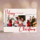 Red Script Merry Christmas Year In Review 3 Photo  Holiday Card<br><div class="desc">Celebrate the season with this festive red script Merry Christmas year in review 3 photo holiday card featuring a touch of elegant charm. The chic design showcases a simple red-and-white colour palette, evoking the cosy spirit of winter. Its modern and unique appeal and rustic wording create a perfect balance between...</div>