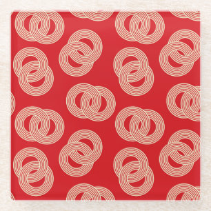 Red shades, interlocked striped rings pattern. glass coaster