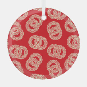 Red shades, interlocked striped rings pattern. glass tree decoration