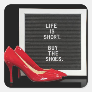 red shoes with quote on board square sticker