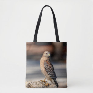 Red Shouldered Hawk on a rock Tote Bag