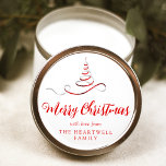 Red Silver Ribbon Tree Merry Christmas Script Classic Round Sticker<br><div class="desc">This modern holiday sticker features a red and silver faux foil ribbon Christmas tree sprinkled with silver faux glitter,  and the words "Merry Christmas" in stylish red calligraphy script. Personalise it with your family's name in serif font.</div>