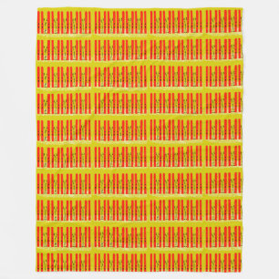 Red skis on yellow fleece blanket