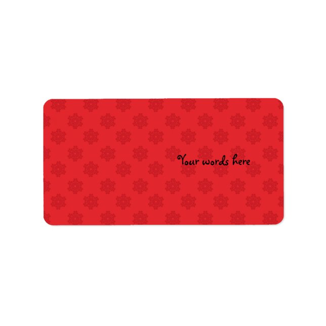 Red snowflake pattern on red label (Front)