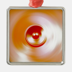 Red spinning music speaker metal ornament